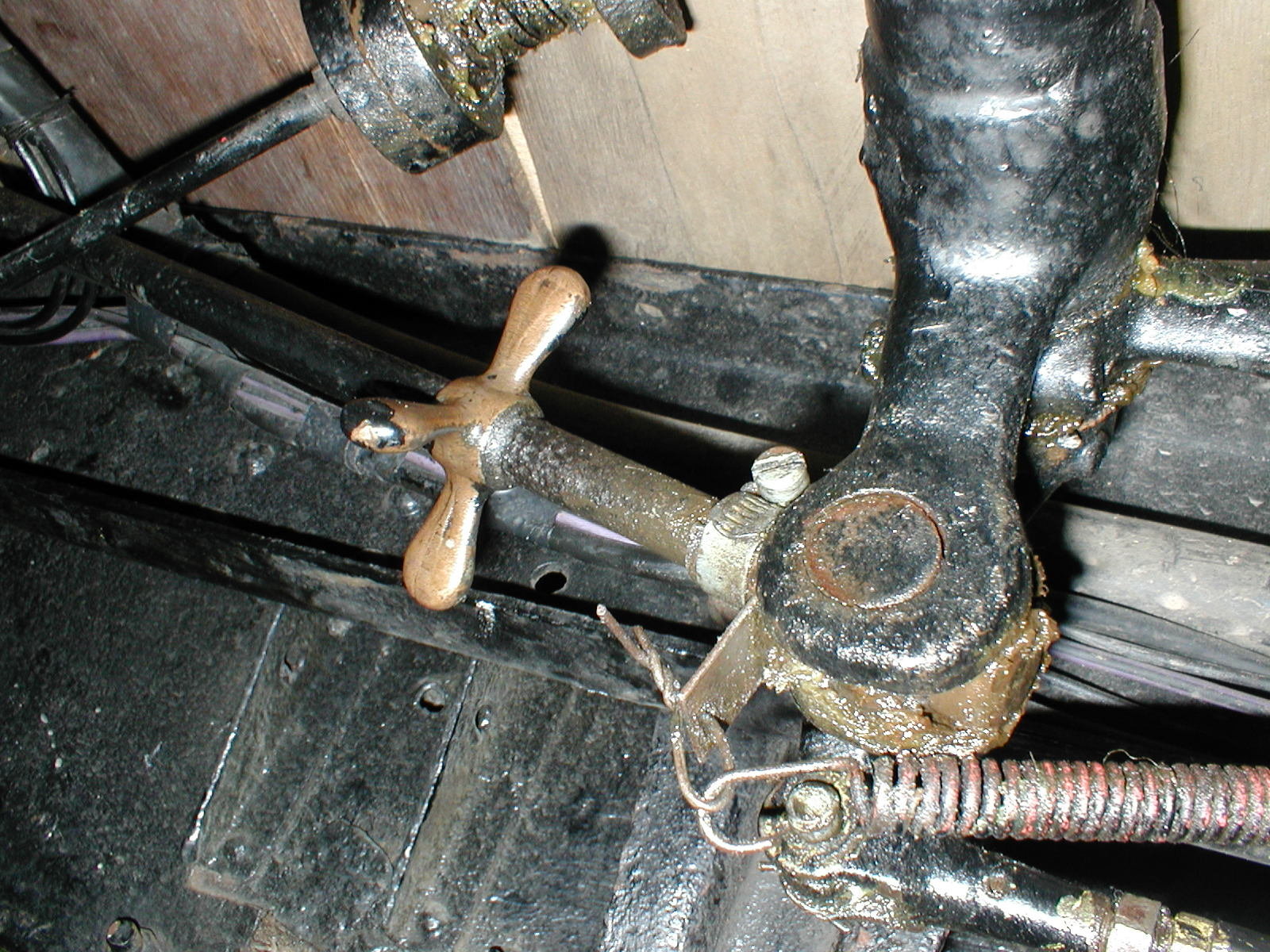 L overall brake adjuster between pedal and cross shaft.JPG